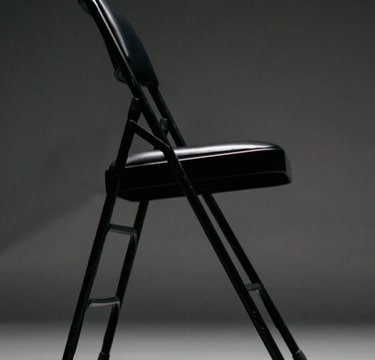 black chair with gray background